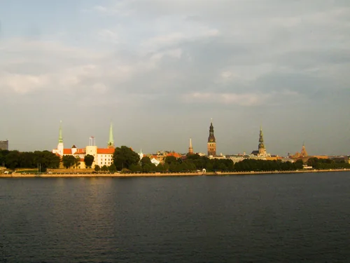 Church spires and Riga Castle on the far bank of a wide river